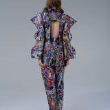 High waisted statement pants with bold geometric pattern