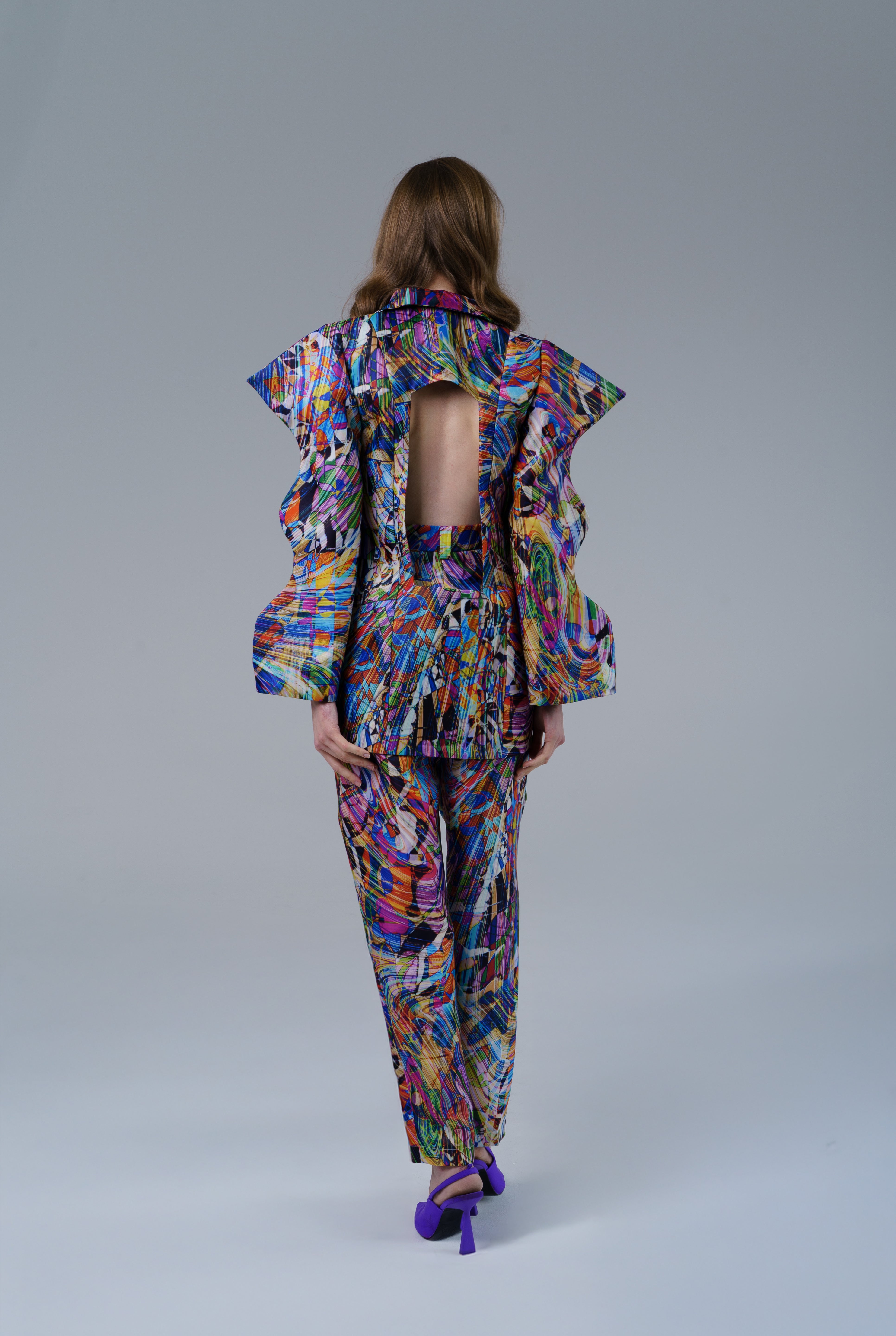 High waisted statement pants with bold geometric pattern