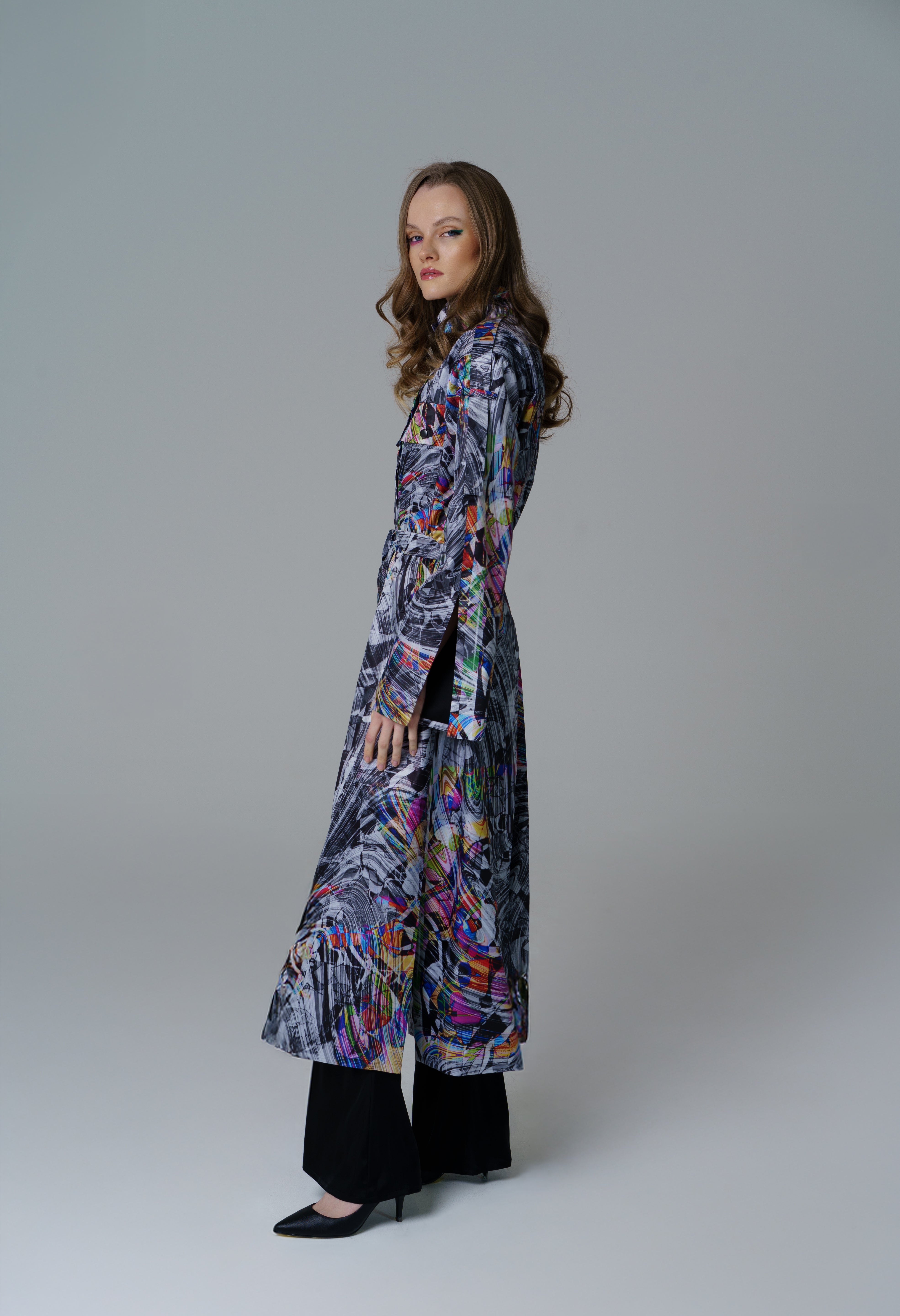 Cosmic Vortex Jacket with monochrome design and vibrant colour accents.