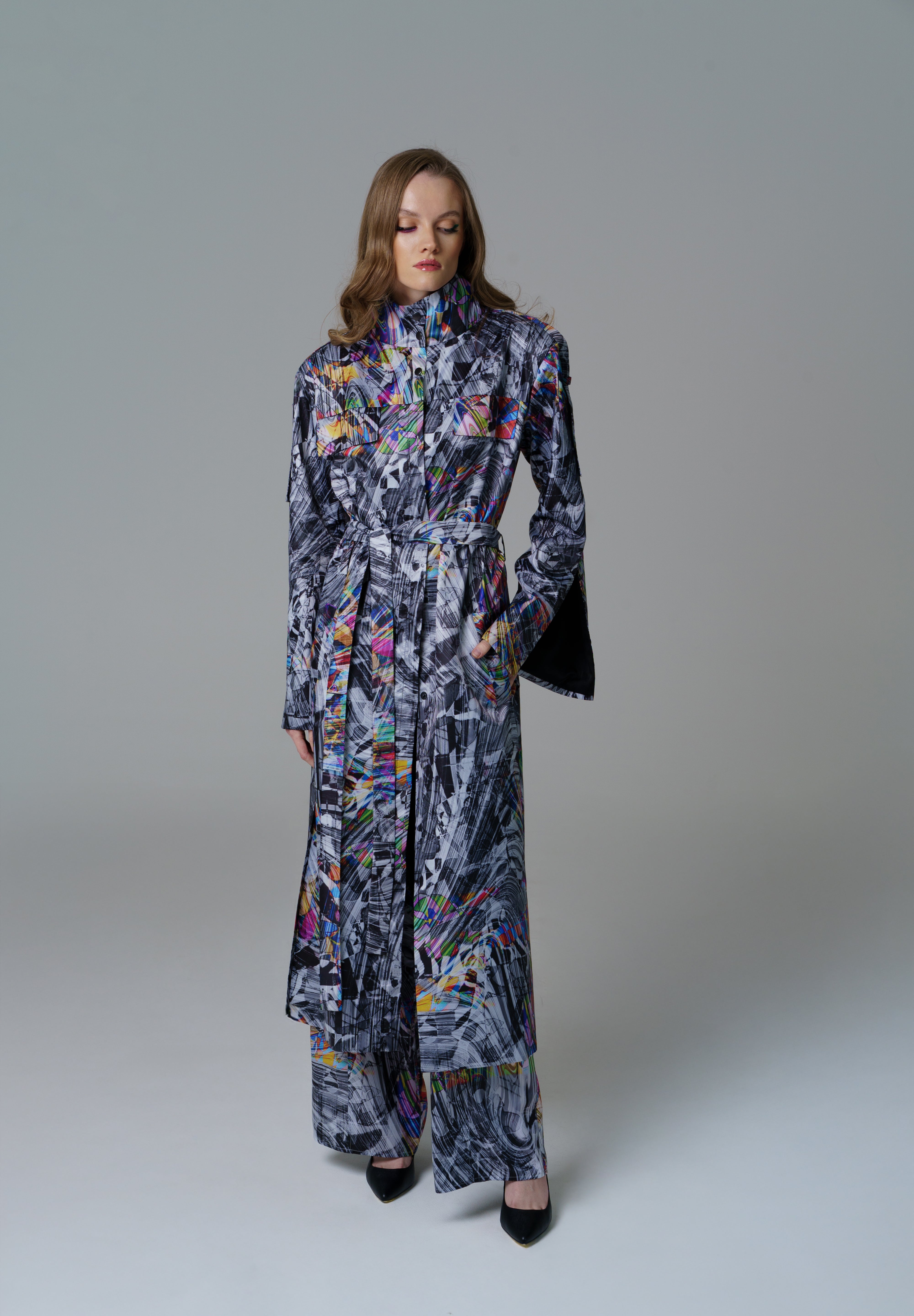 Cosmic Vortex Jacket with monochrome design and vibrant colour accents.