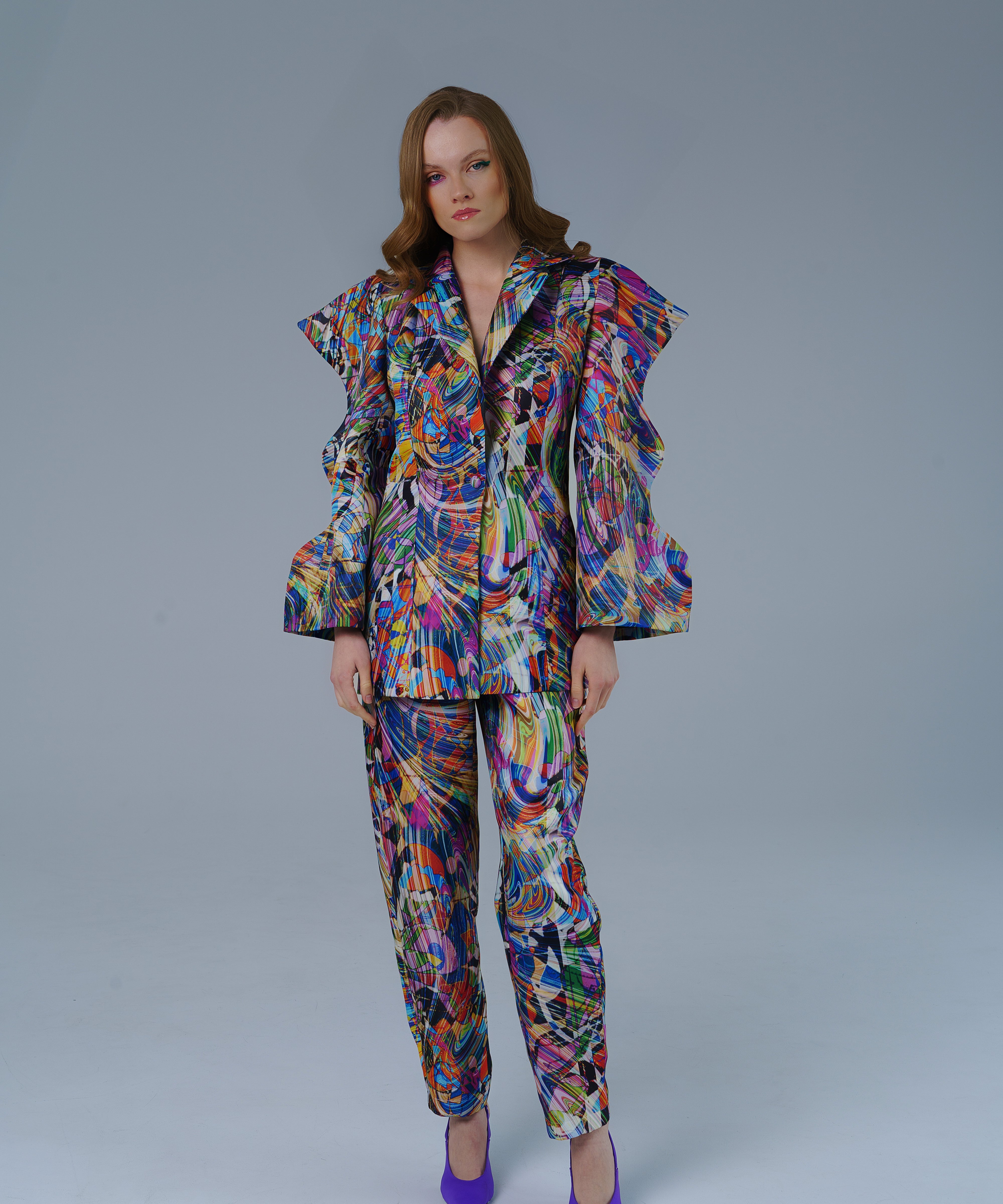 High waisted statement pants with bold geometric pattern