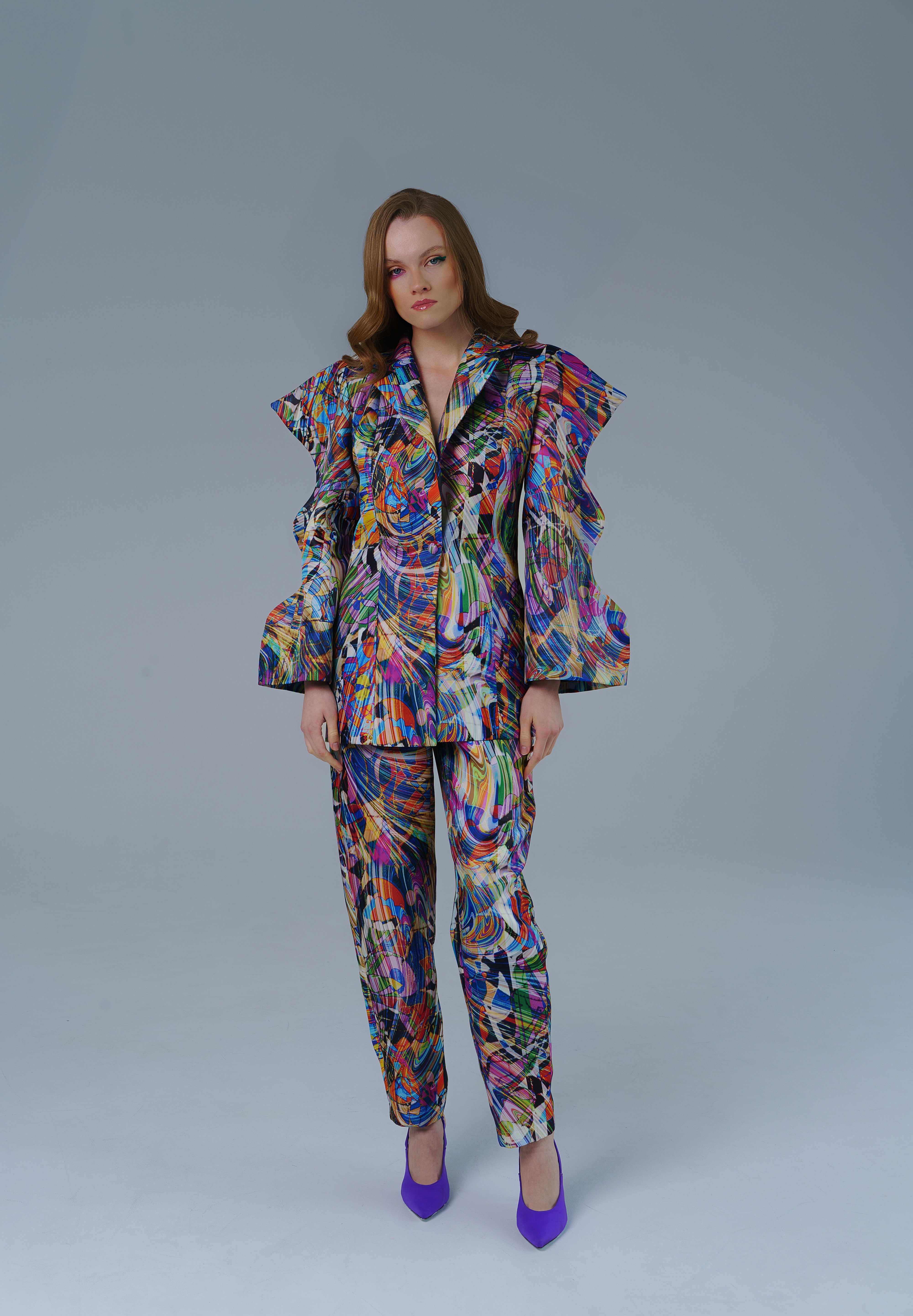 High waisted statement pants with bold geometric pattern