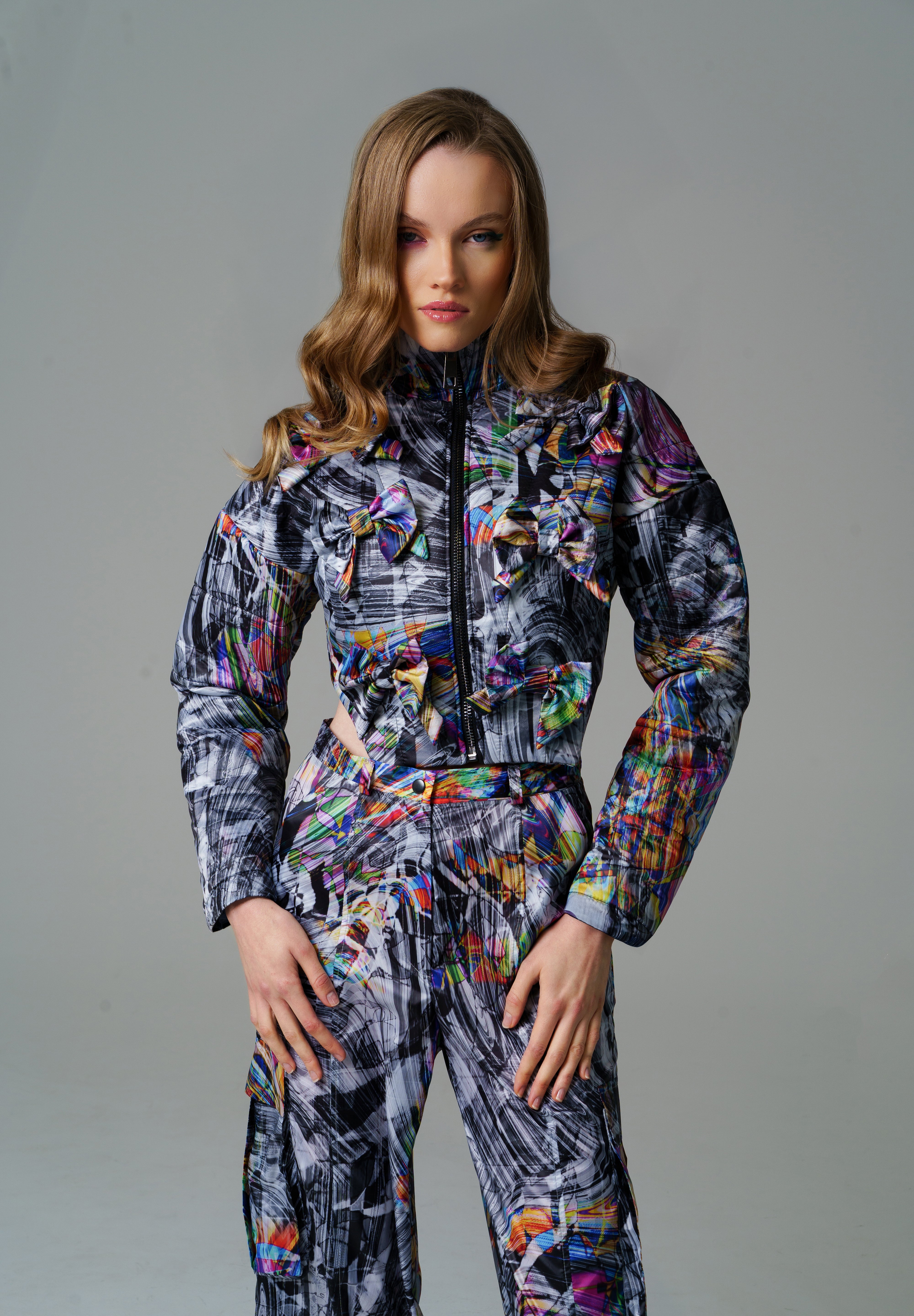 Cosmic Vortex Puffer with monochromatic patterns and bold colour accents.
