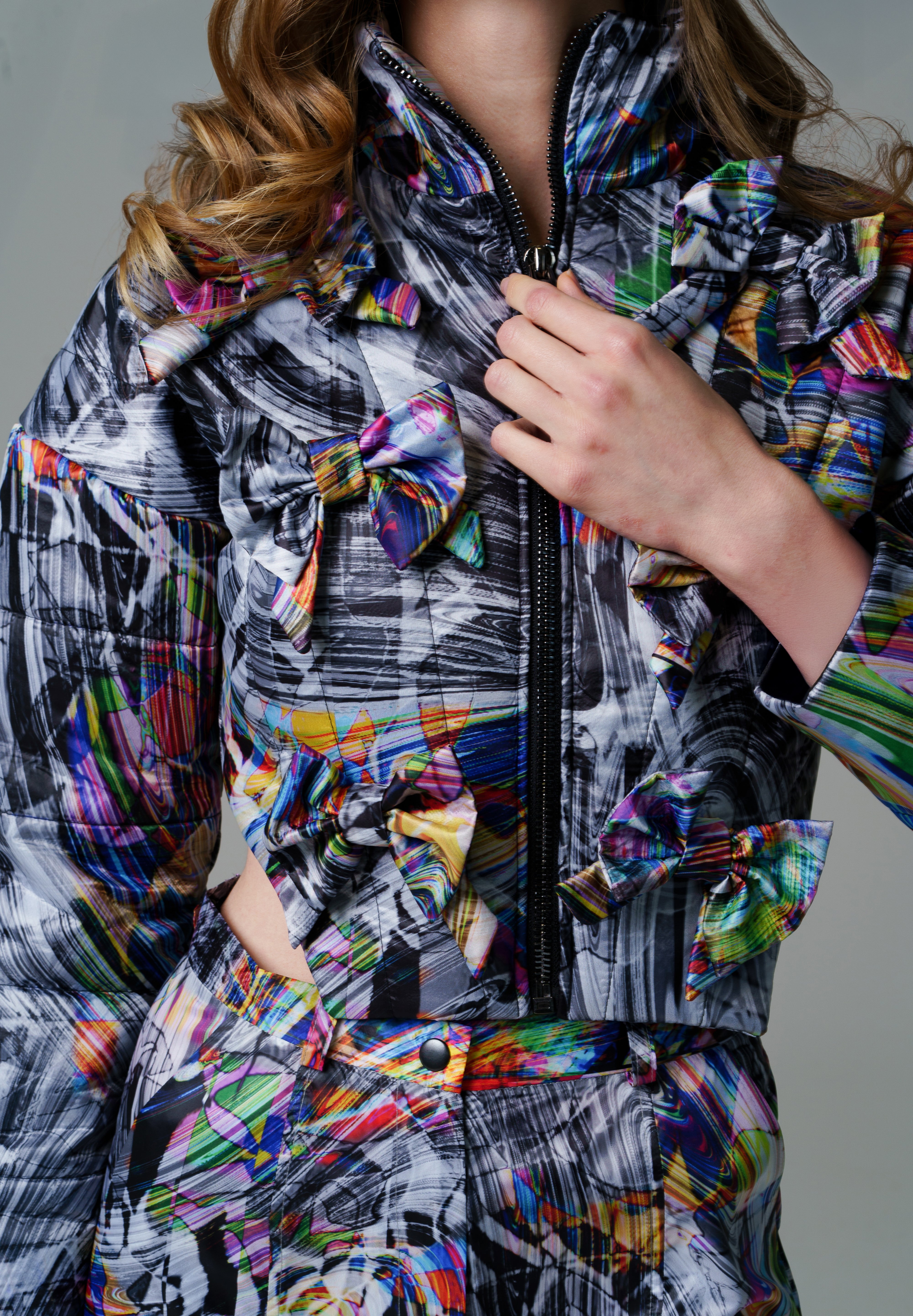 Cosmic Vortex Puffer with monochromatic patterns and bold colour accents.