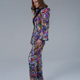 High waisted statement pants with bold geometric pattern