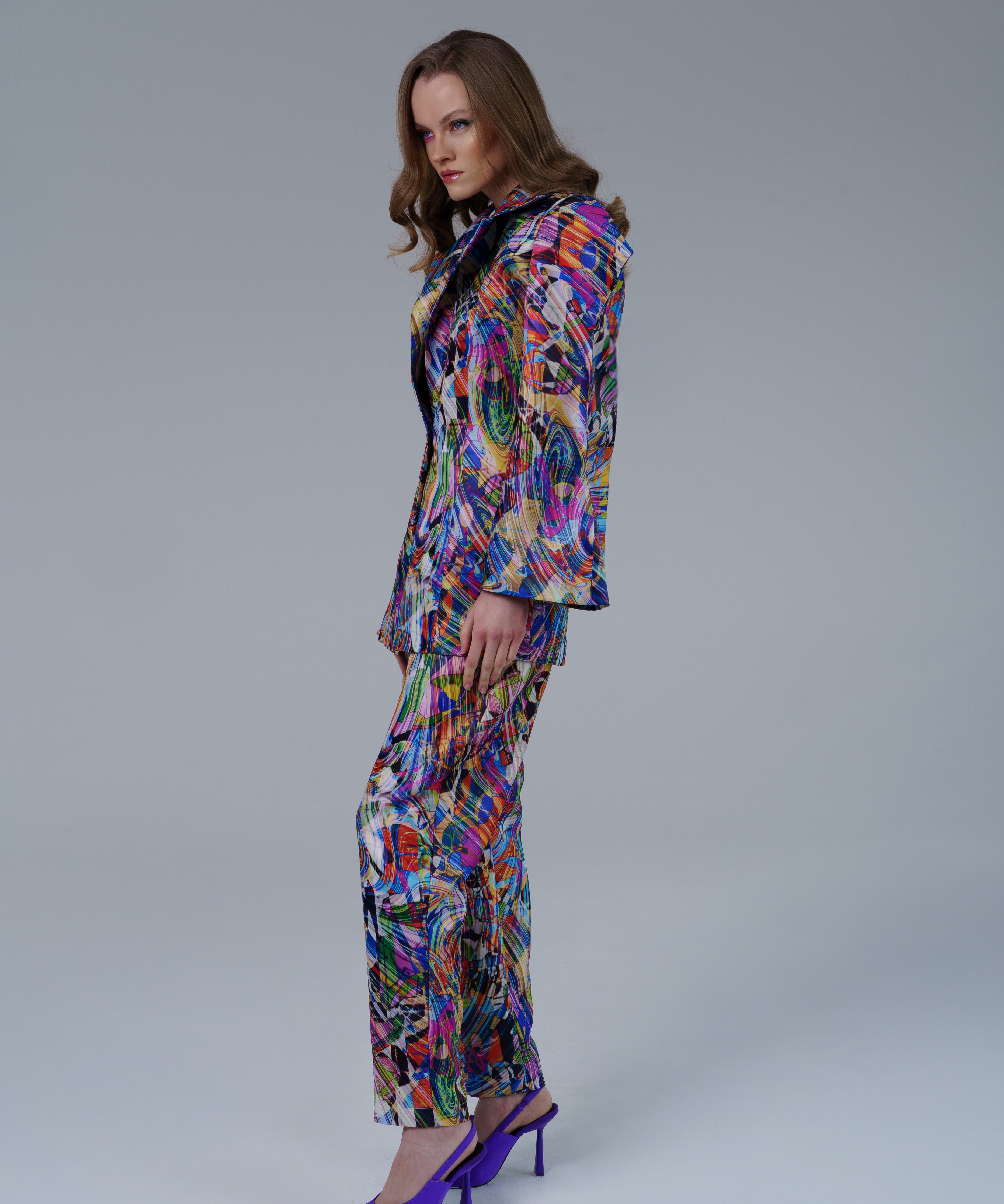 High waisted statement pants with bold geometric pattern