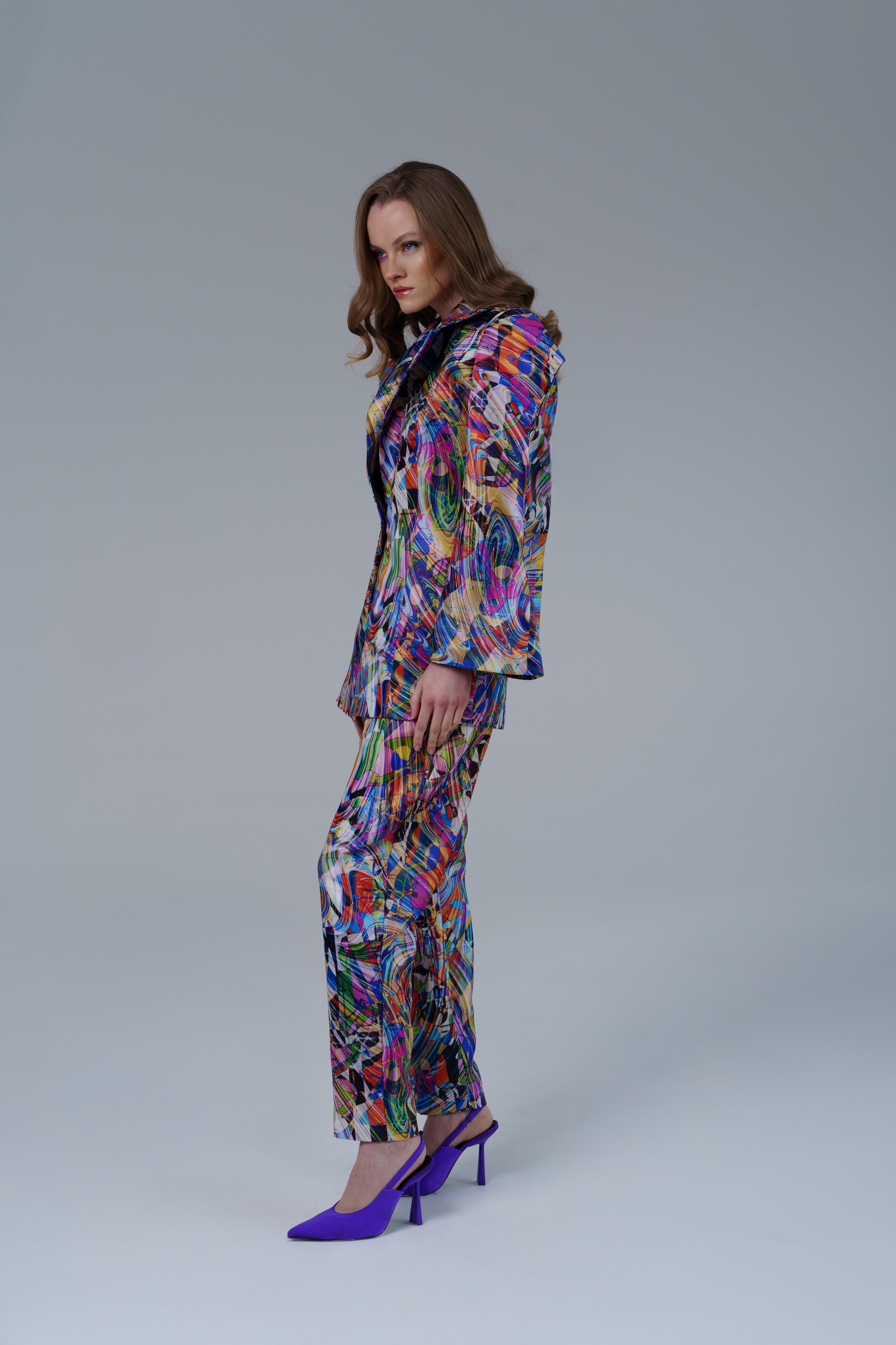 High waisted statement pants with bold geometric pattern