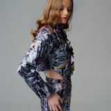 Cosmic Vortex Puffer with monochromatic patterns and bold colour accents.