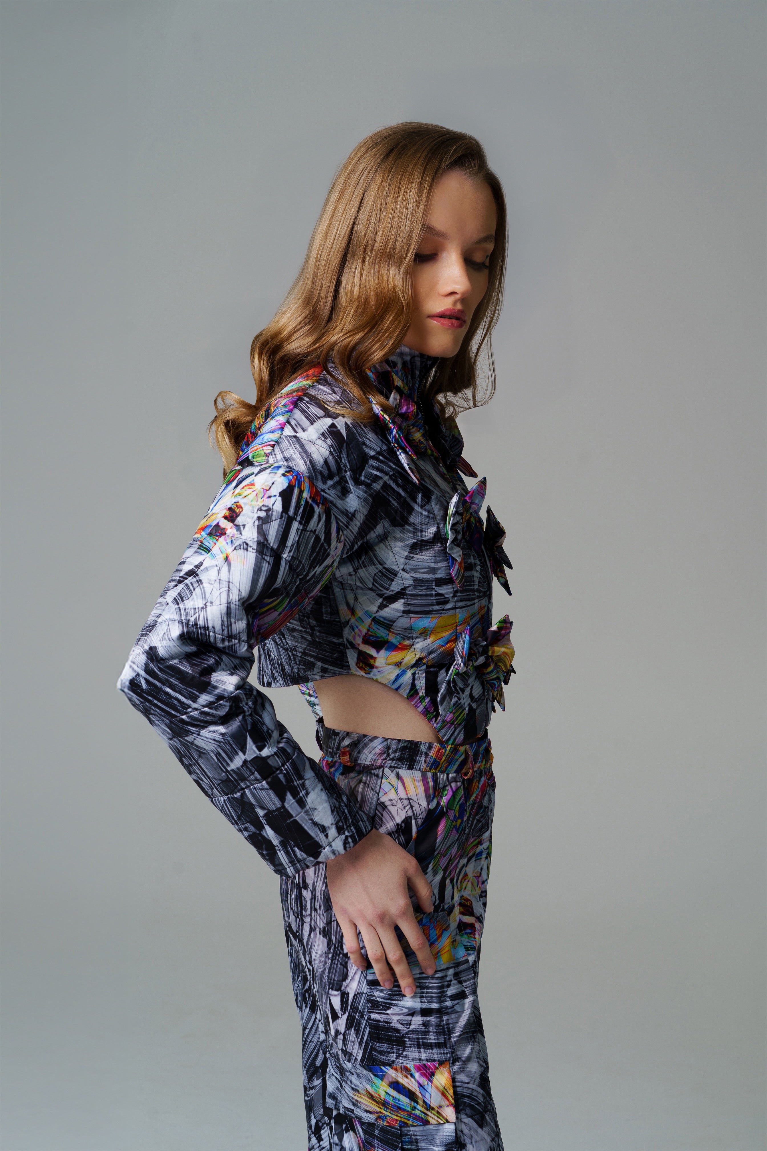 Cosmic Vortex Puffer with monochromatic patterns and bold colour accents.