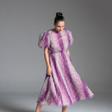 Feather Dress with metallic fabric, short puffed sleeves.