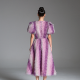 Feather Dress with metallic fabric, short puffed sleeves.