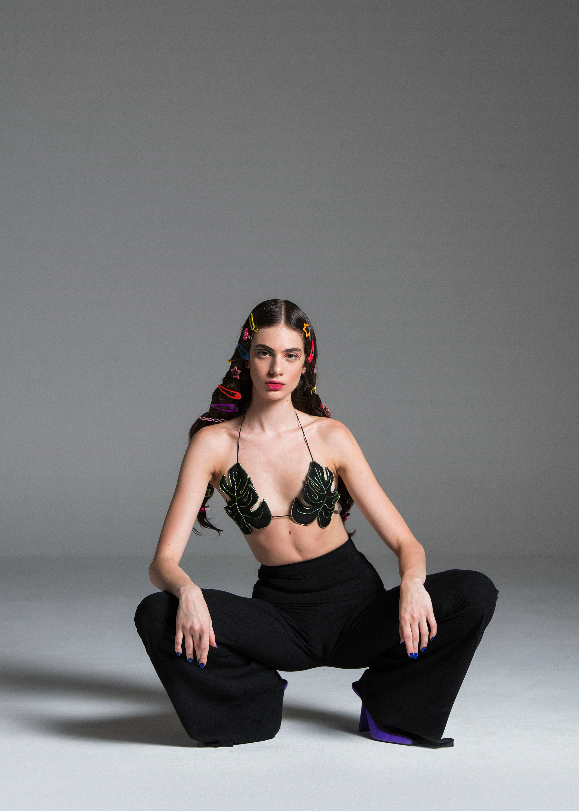 Monstera bra with monstera patterns on a black base and green embroidery stones.